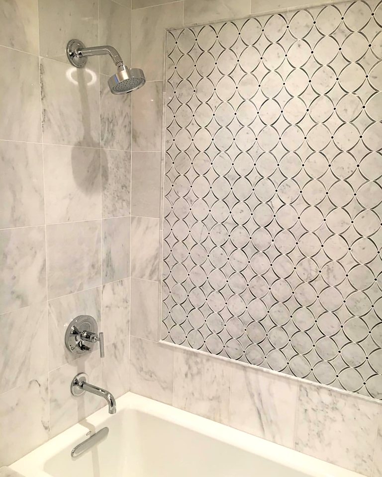 Carrara with a cut-stone accent